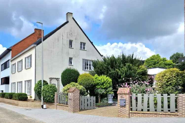 Huis te koop in Lummen met twee woningen en grote tuin