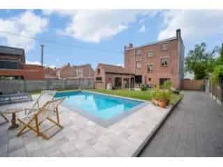Huis te koop Hulste - Ruime gezinswoning met zwembad en garage