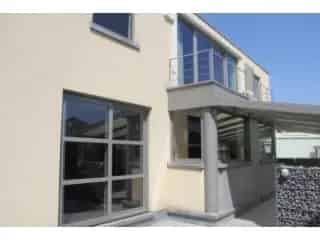 Serrebedrijf met Moderne Woning te Koop Halen