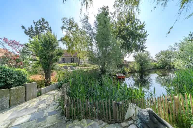 Hoeve te koop in Wulveringem 7000m² met bijgebouwen