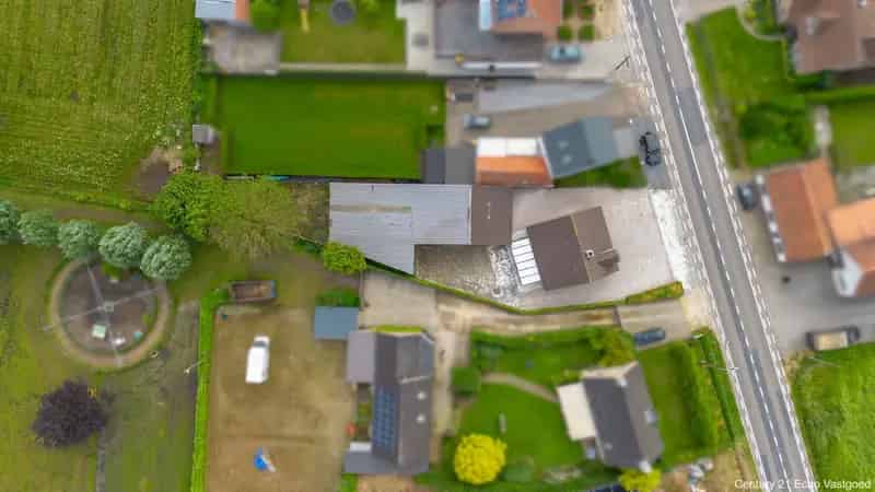 Huis te koop Ravels: Karakterwoning met garages en tuin