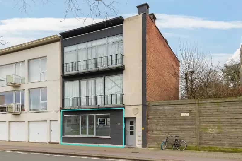 Ruim gelijkvloers appartement 2 slaapkamers tuin zeer centraal