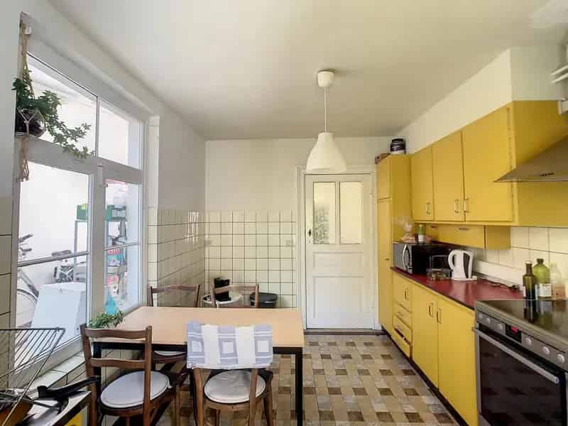 Charmante 4 Slaapkamerwoning met Tuin in Leuven Centrum