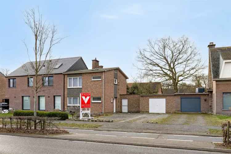 Huis te koop halfopen bebouwing in Hemiksem met zonnige zuidtuin