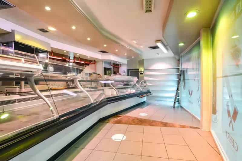 Commerciële Winkel en Woonhuis te Ettelgem
