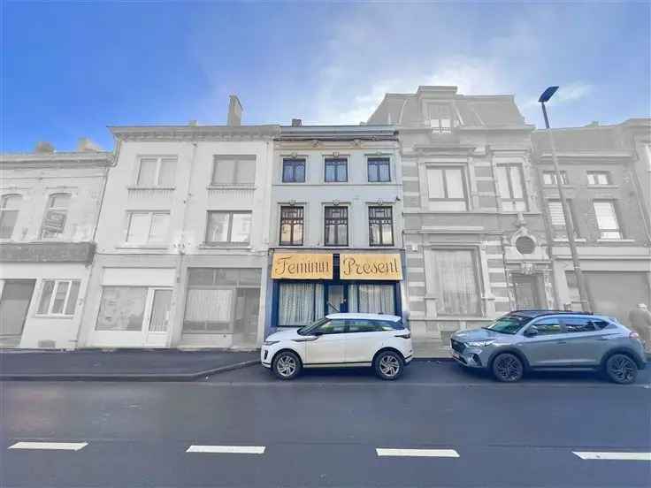 Maison de rapport met rez commercieel en duplex potentieel