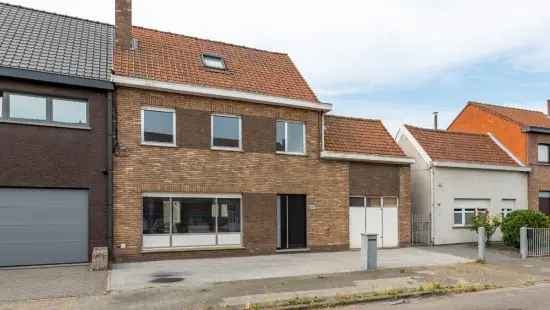 Ruime woning met 5 slaapkamers, garage en tuin