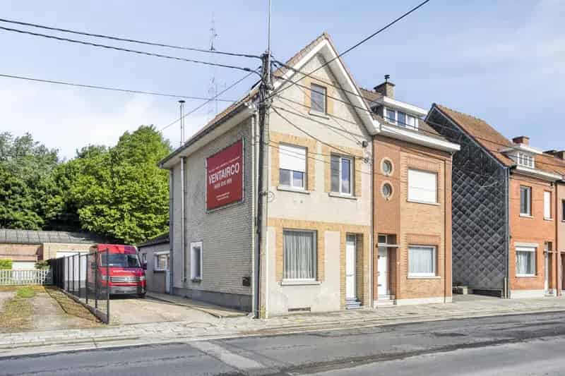 Halfopen Huis te Koop Kortrijk met Atelier en Ruime Garage