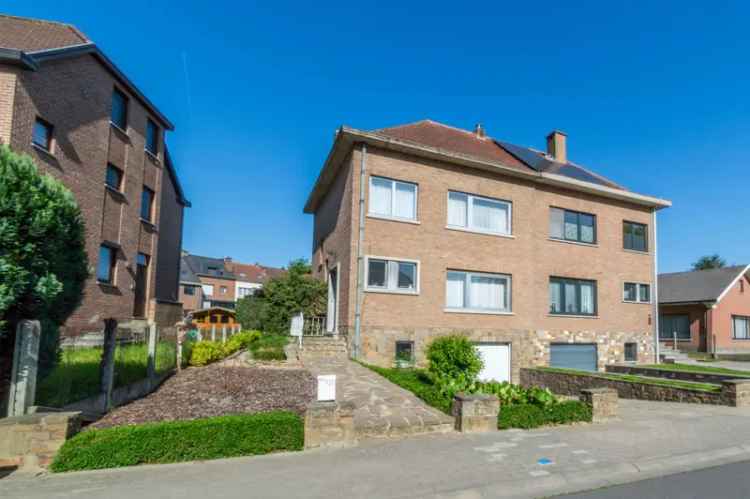 Huis te huur Sint-Pieters-Leeuw: 3 slaapkamers, garage en tuin
