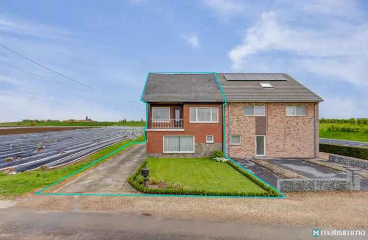 Huis te koop Dilsen-Stokkem: 4 slaapkamers, garage, grote tuin