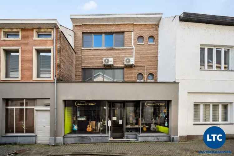 Te koop woning Tienen met handelsruimte en 2 woonkamers