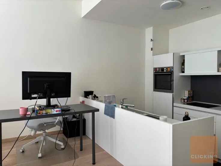 Appartement te koop Brussel 1 slaapkamer terras tuintje