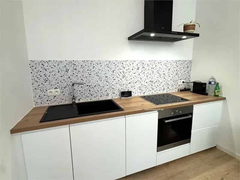 Gerenoveerde woning te Oostende 2 slaapkamers centrum strand