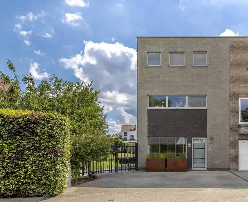 Huis te huur Dilbeek: Instapklare gezinswoning met atelier