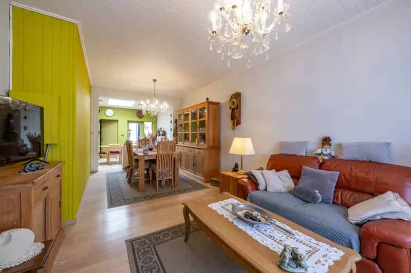 Huis te Koop Niel: Instapklare Rijwoning met Stadstuin