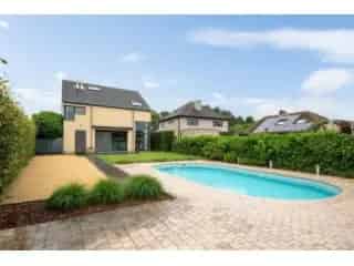 Huis te koop Geel - Instapklare woning met zwembad en sauna