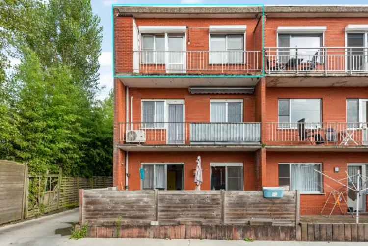 Te koop appartement met 2 slaapkamers, terras en garage in rustige omgeving