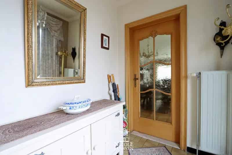 Gelijkvloerse woning met tuin te Dilsen