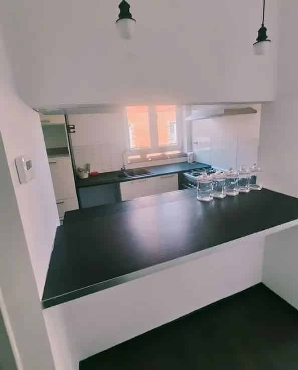 Appartement renove Evere 2 chambres balcon caves