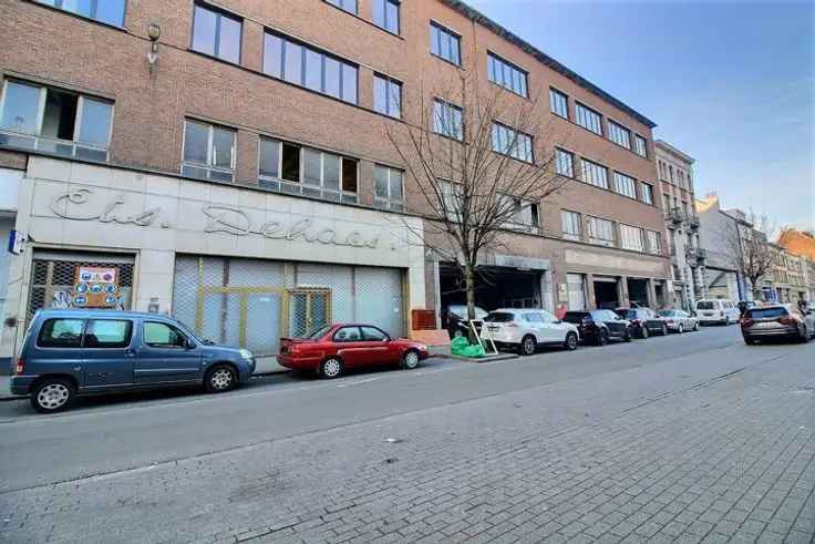 Te koop appartement in Heyvaert met vergunning voor 16 luxe wooneenheden