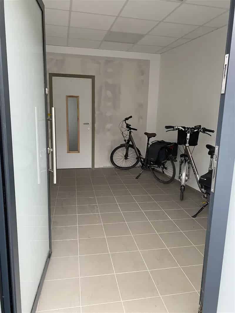 Investeringspand Sint-Truiden: Handelsruimte & Duplex Appartement
