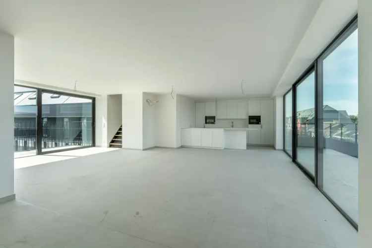 Luxueus duplex penthouse van 160m² met 2 terrassen in hartje Bilzen!