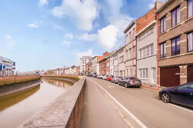 Te renoveren herenhuis aan de Dijle met 4 slaapkamers en tuin
