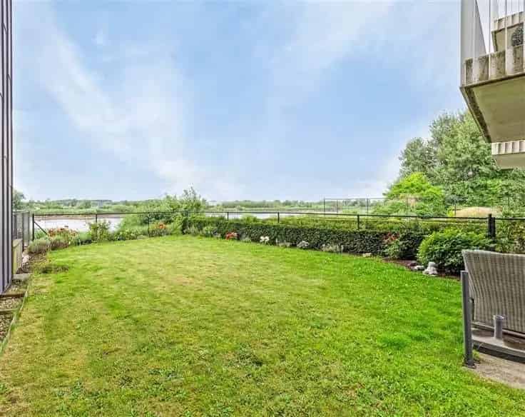 Appartement te Koop Niel: 3 slaapkamers, Tuin, Uitzicht op Water