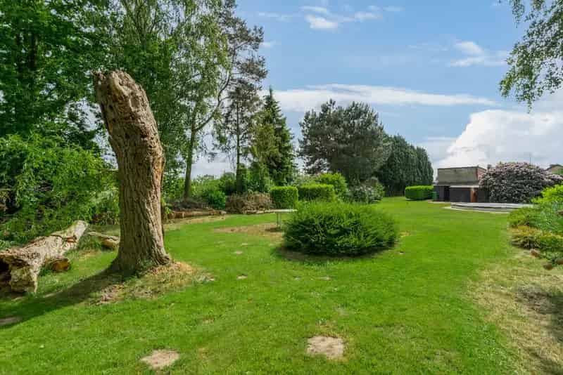 Huis te koop: Ruime woning met 3 slaapkamers, grote tuin en hoge garage