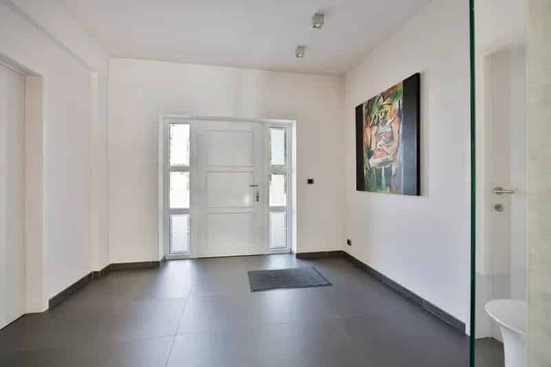 Stijlvol Wonen in As: Ruime Instapklare Woning met Tuin en Garage