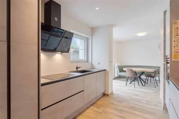Huis Te Koop Neeroeteren: Instapklare woning met 3 slaapkamers en tuin