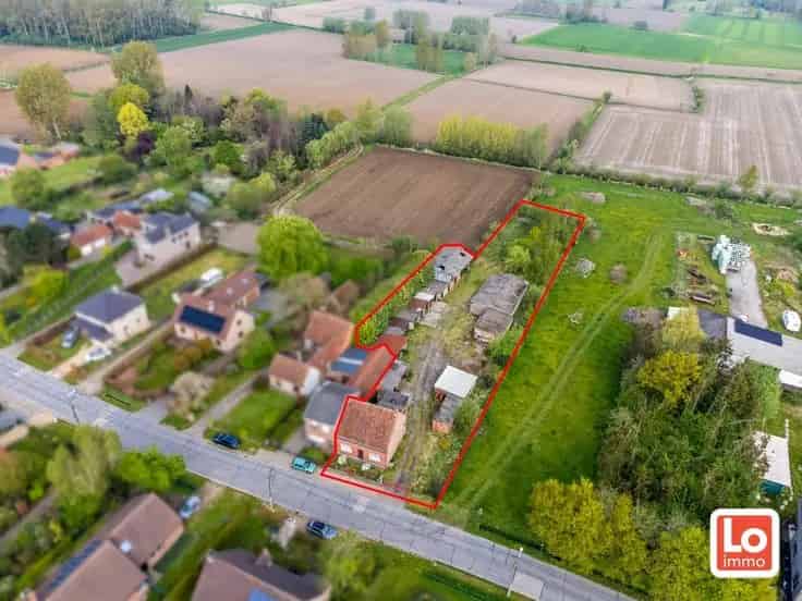 Huis Te Koop Landelijk gelegen te renoveren woning met stallingen