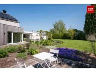 Huis te Koop Evergem - Instapklare woning met 2 slaapkamers en tuin