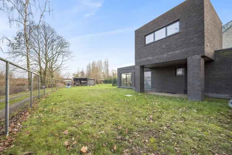 Huis te koop Stekene: Woning met handelspand en ruime tuin