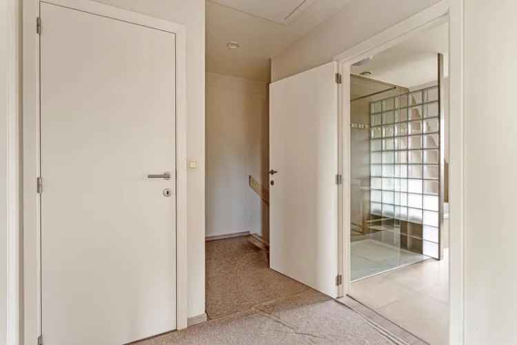 Huis te Koop Deinze: Charmante Halfopen Bebouwing met Garage