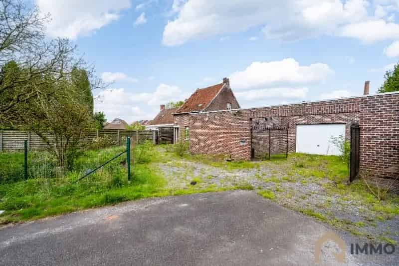 Grond met 2 woningen te slopen Hulste 1348m²