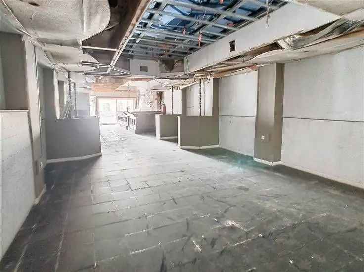 Handelspand met Appartement Te Koop Nabij Station