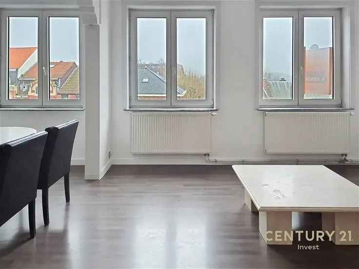 Te koop appartement in Berchem-Sainte-Agathe met terras en twee kelders