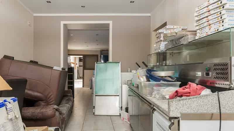 Handelszaak met Duplex Appartement Tienen Centrum