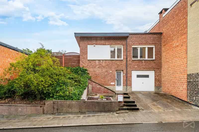 Huis te koop: gerenoveerde bel-etage met garage en tuin