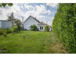 Huis te koop Buggenhout - Instapklare woning met 5 slaapkamers en tuin