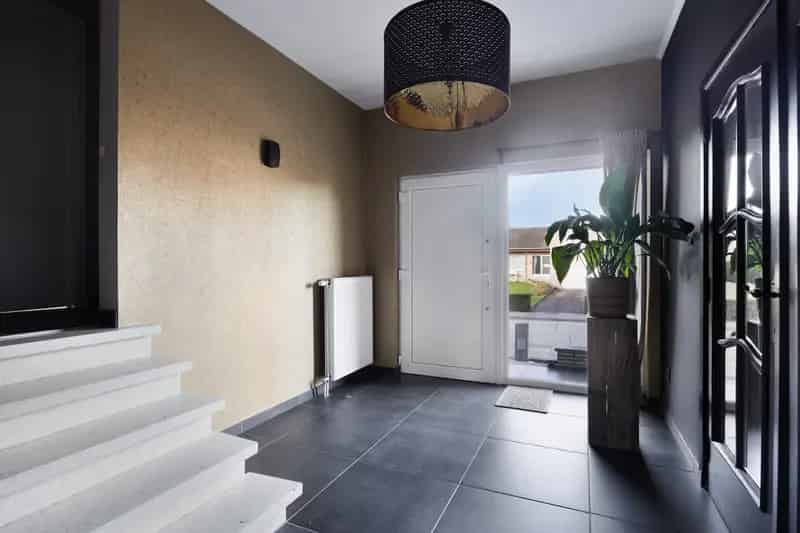 Huis te koop Maasmechelen: Moderne split-level woning met tuin