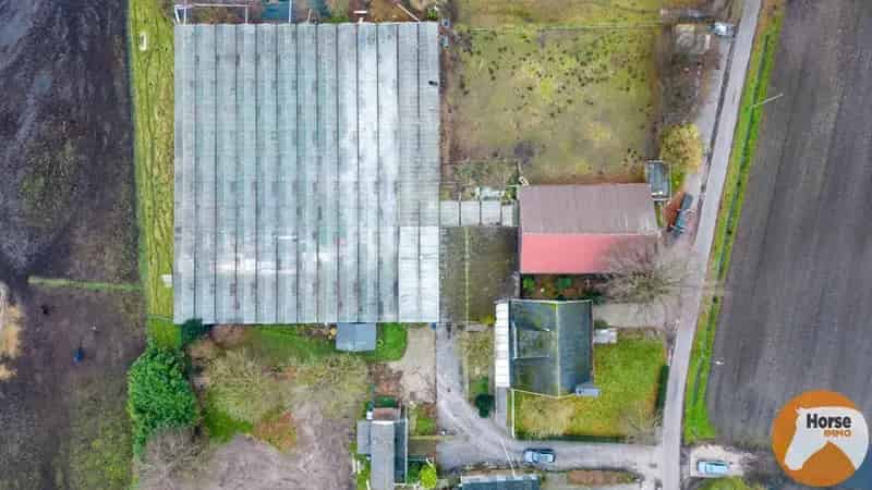Huis te koop Sint-Katelijne-Waver: Ruime woning met serre en loods