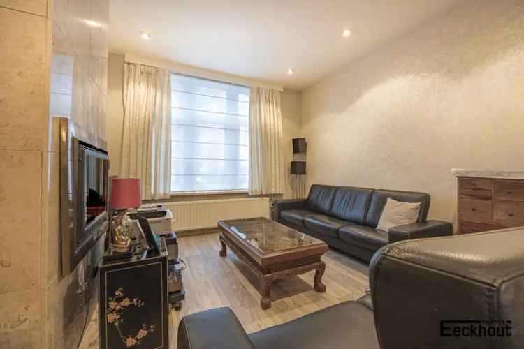 Rijwoning te koop: gerenoveerd, stadstuin, nabij strand en centrum