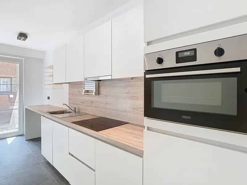 Appartement te koop Tienen: gerenoveerd, 2 slaapkamers, parking