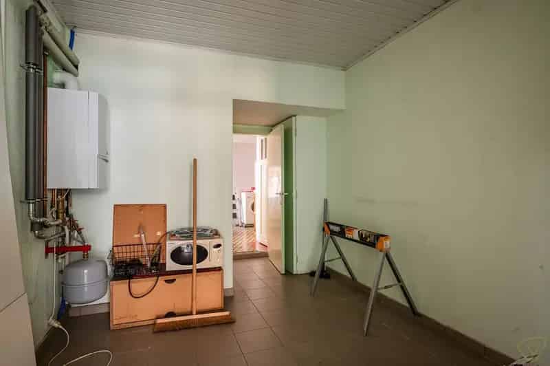 Woning met Winkelruimte te Koop Ursel Centrum