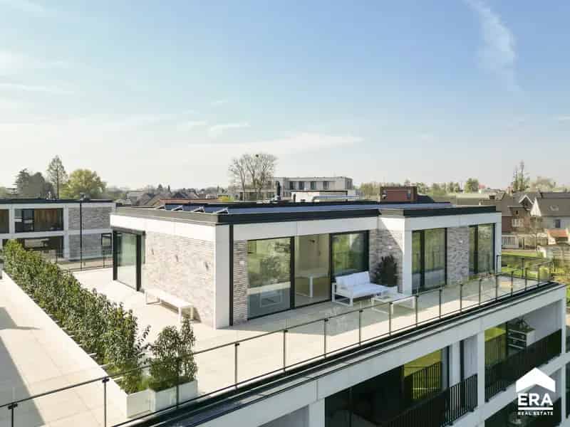 Penthouse te koop Hoeselt: 2 3 slaapkamers ruim terras
