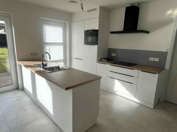 Te huur modern appartement met tuin in Tessenderlo