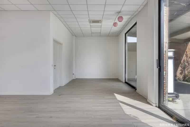 Huis te huur Mechelen: Instapklare woning met handelsruimte en garage