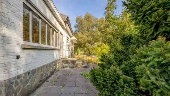 Te renoveren of te slopen woning op mooi perceel van 1.767 m